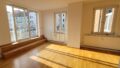 Wohnzimmer mit Zugang zur Dachterrasse